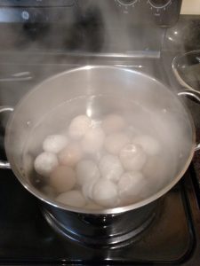 eggs boiling on stove